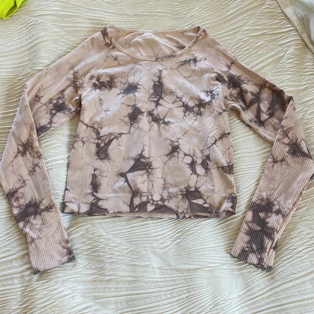 Long sleeve workout top size M with thumb holes.